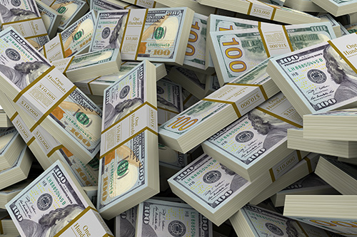 pile of thousands of hundred dollar bills grouped in $10,000 stacks
